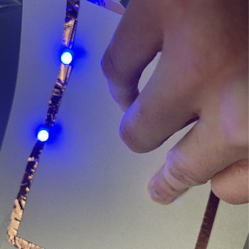 This image shows the two leds placed next to each other on a standard circuit lighting up.